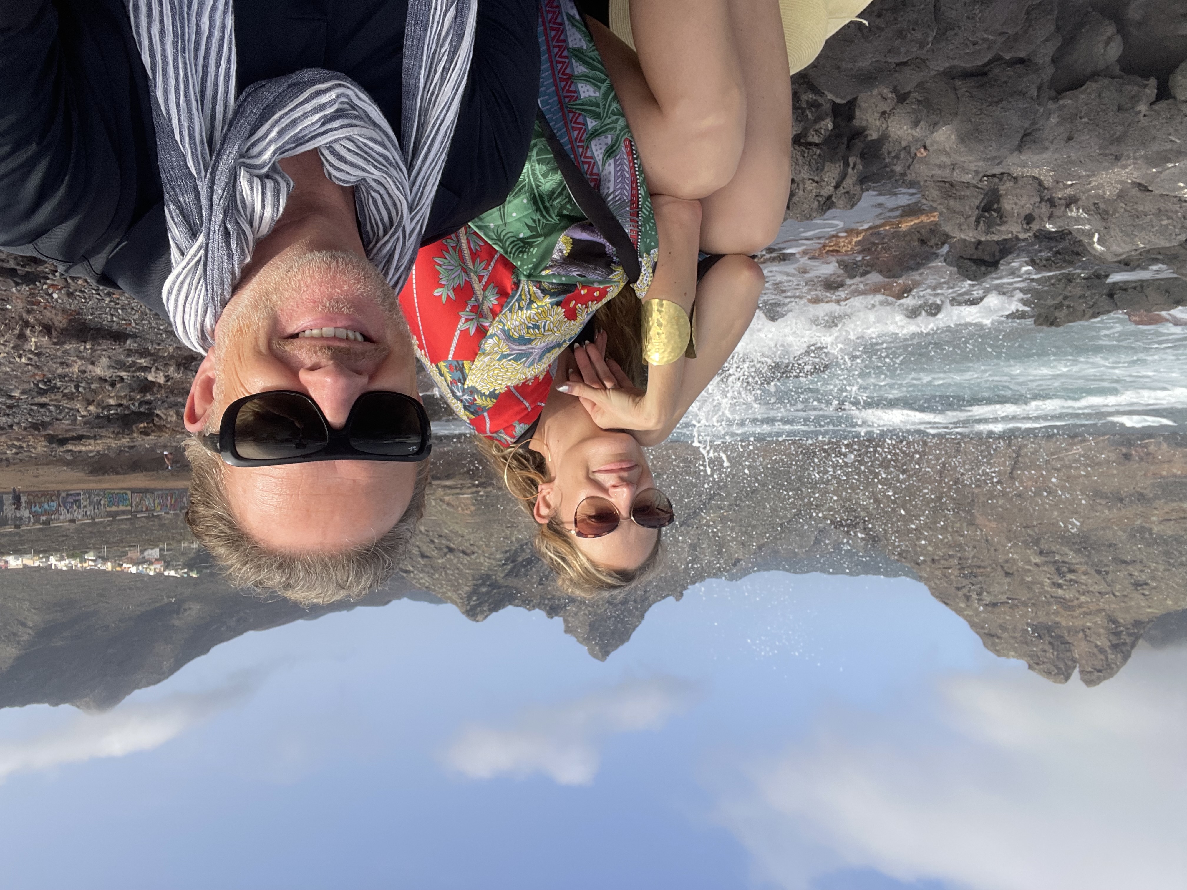 Lady E and Felix on a volcanic coast