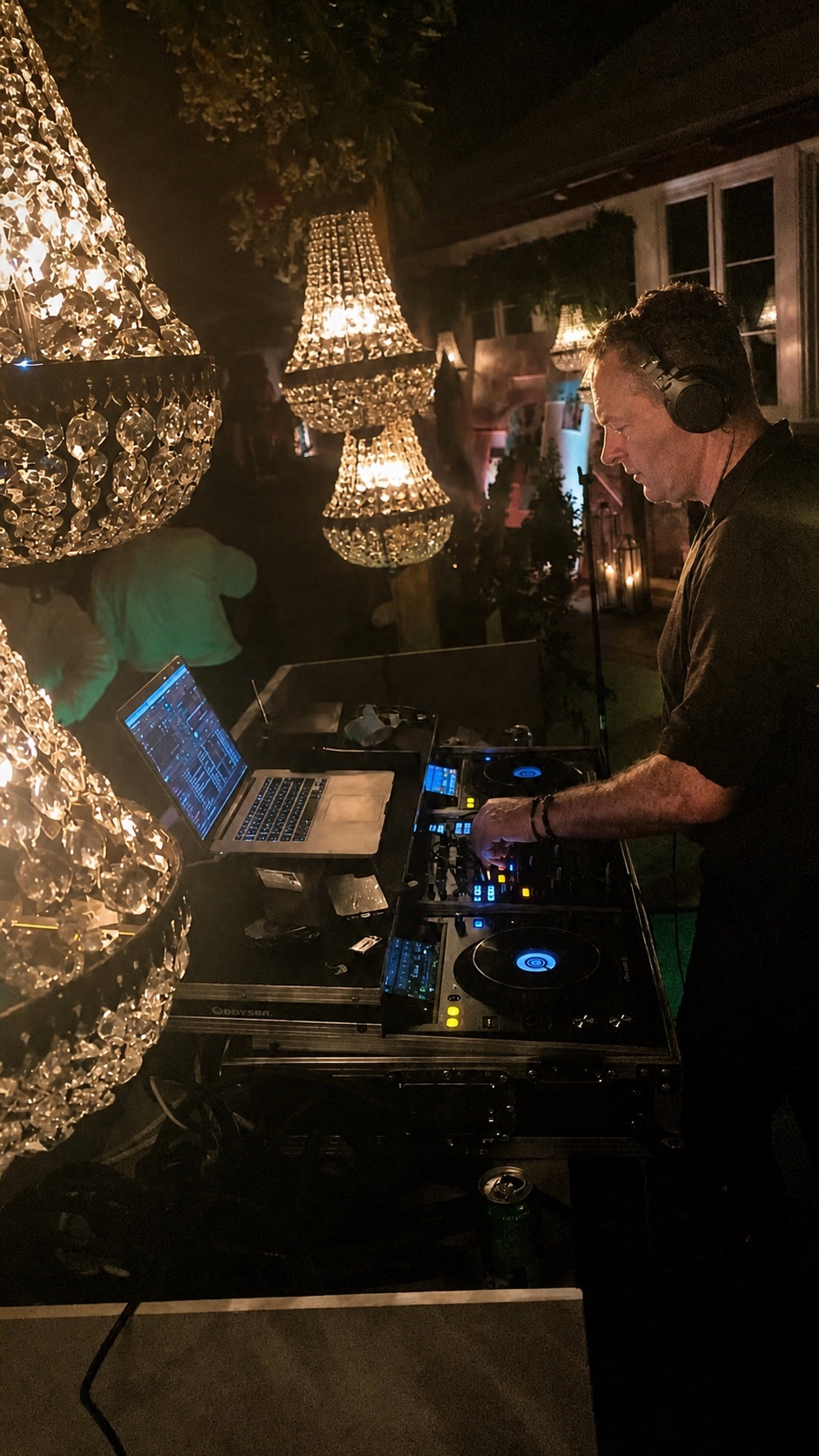 Felix performing behind the decks in a club